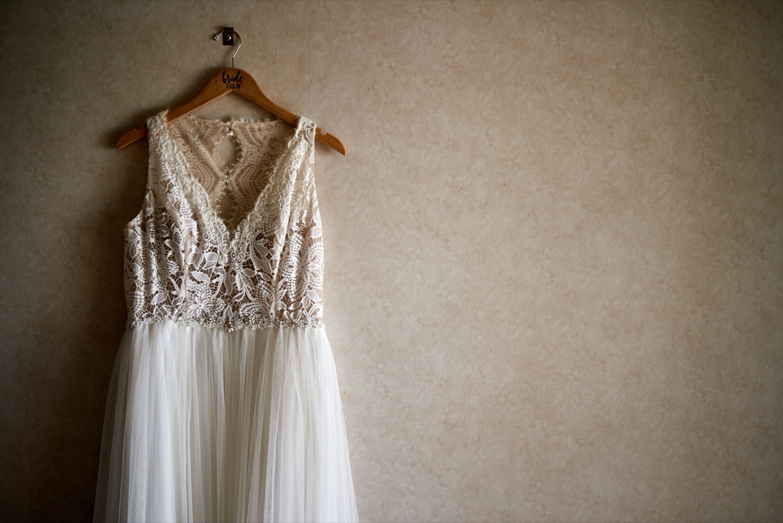 Designer gown hanging in the boutique
